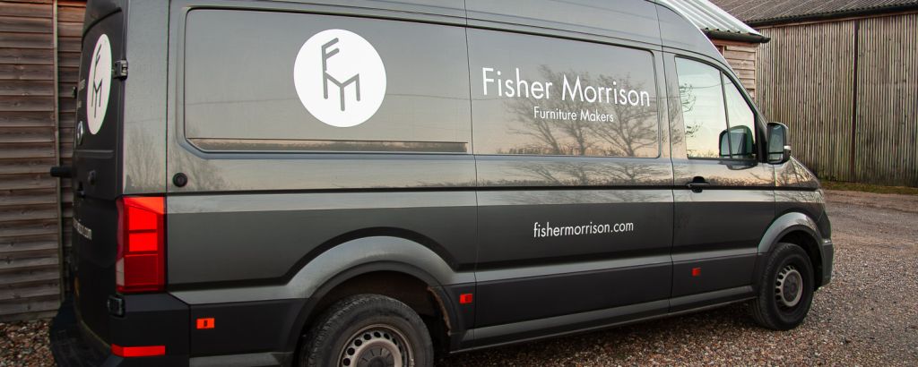 Fisher Morrison van parked outside the workshop.