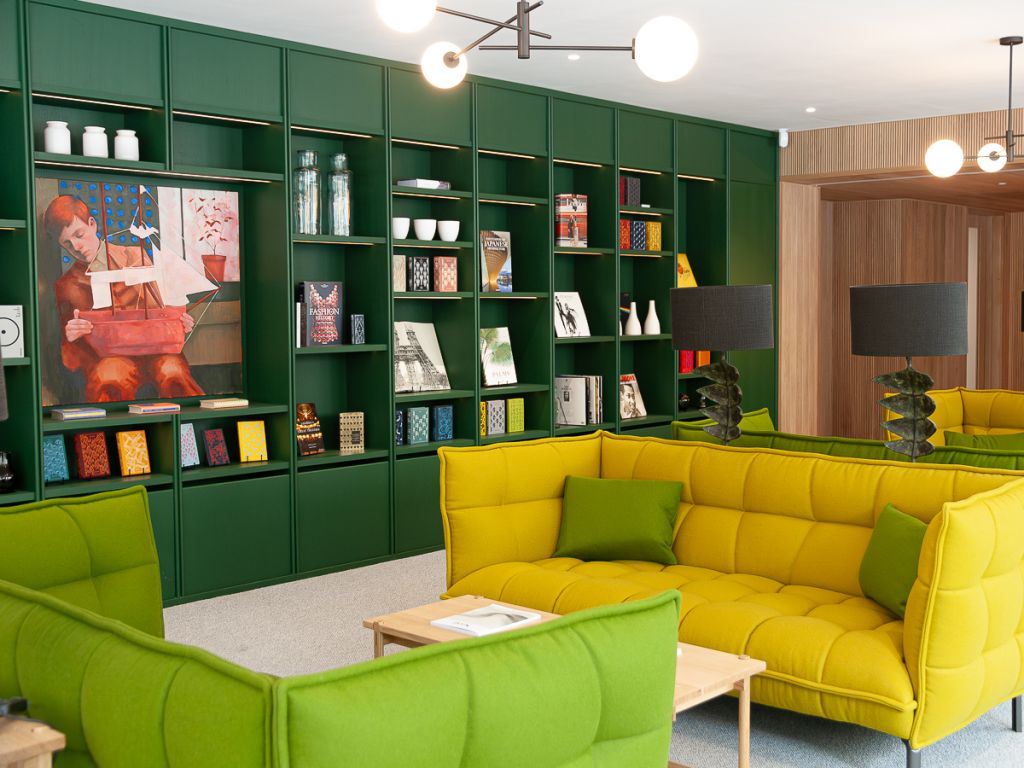 fixed shelving unit with drawers and led lighting in green