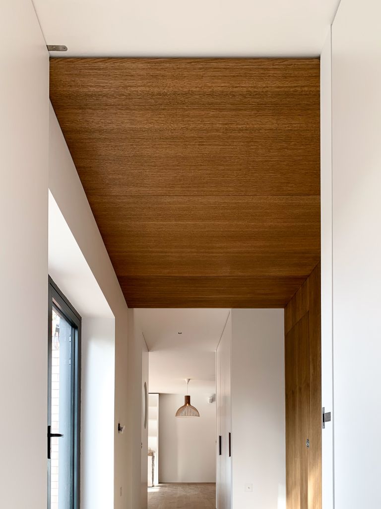 dark timber ceiling and wall panels